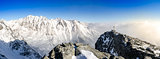 Panoramic scenic view of winter mountains in High Tatras, Slovak