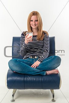 young woman with a glass of milk