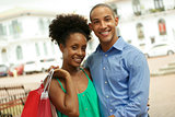Portrait African American Couple Shopping In Panama City Smiling