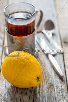 Lemon and glass of tea.
