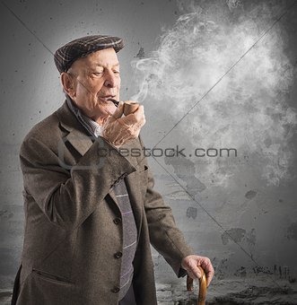 Old man smoking pipe