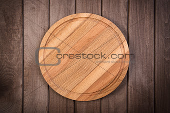 cutting board on dark wooden background