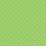 Tile vector pattern with small white polka dots on pastel spring green background