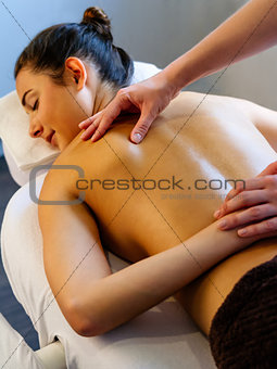 Back massage on young woman
