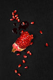 Pomegranate on black background.