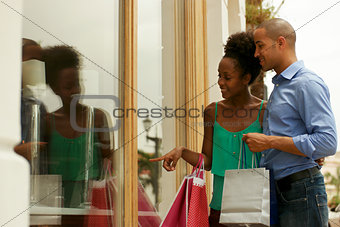 African American Couple Looking Shop Window In Panama City