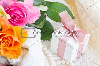 pink and orange roses with lace