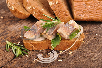 delicate spicy herring with fresh rye bread