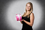 Smiling woman with present