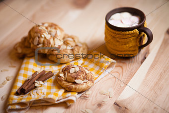 almond cookies on light wood table