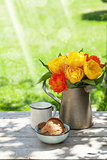 Colorful tulips bouquet, cookies and milk