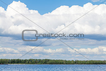 Blue sky and clouds over river