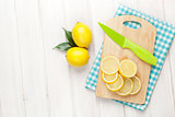 Sliced lemon on cutting board