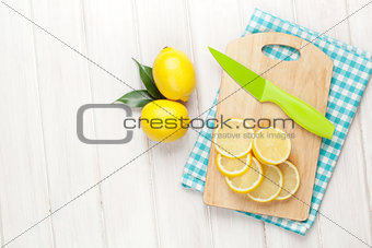 Sliced lemon on cutting board