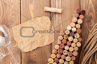 Wine bottle shaped corks, wine glass and corkscrew