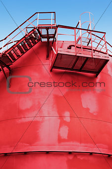 red fuel tank with a stairs
