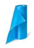 Vertical roll of blue plastic garbage bags