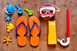 summer stuff, such as a pair of flip-fllops, a diving mask or a 