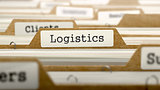 Logistics Concept with Word on Folder.