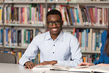 Portrait Of Clever Black Student With Open Book
