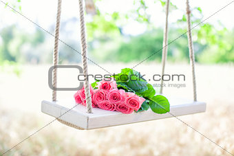 Flowers on a swing