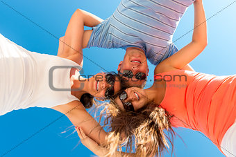 shooting a group of young people from low angle
