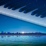 abstract night background with city and piano keys