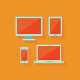 Flat computer and mobile devices set over orange