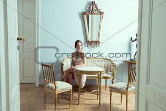 elegant model in luxury room
