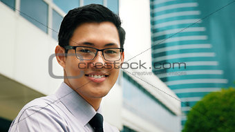Portrait Chinese Businessman Smiling Outside Office Skyscraper