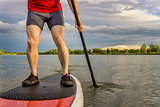 stand up paddling on lake