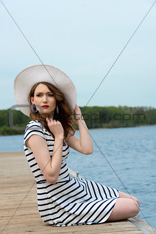 fashion girl in vacation on lake 