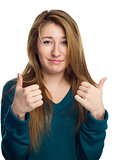 Young woman is showing thumb up gesture 