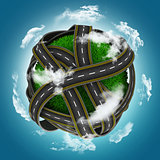 3D grassy globe with roads against a blue cloudy sky