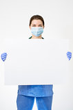 Doctor holding blank placard