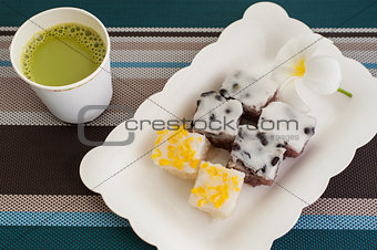 Traditional Thai Dessert With Hot Milk Green Tea  On Plate