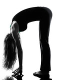woman dancer  stretching warming up exercises silhouette