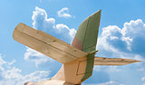 Tail of aircraft, blue sky background