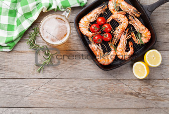 Grilled shrimps and beer