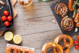 Beer mug, grilled shrimps, sausages and pretzel