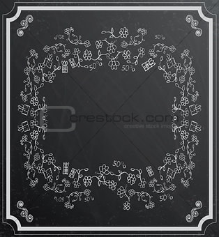 Flower frame on black chalkboard