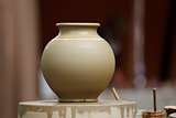 Raw clay vase