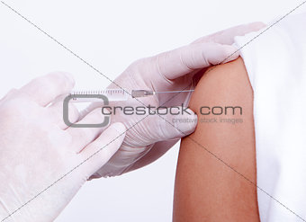 Nurse giving a vaccine for a patient
