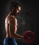 Man training biceps