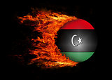 Flag with a trail of fire - Libya