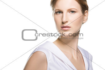 Fashion portrait of a girl in the beautiful designer white dress