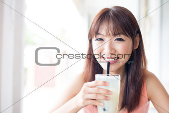 Drinking beverage at cafe