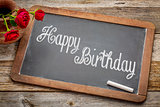 Happy Birthday greetings on blackboard
