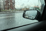rain outside the window of the car