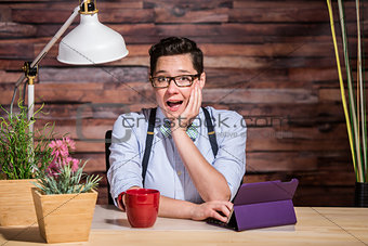 Excited Woman at Desk